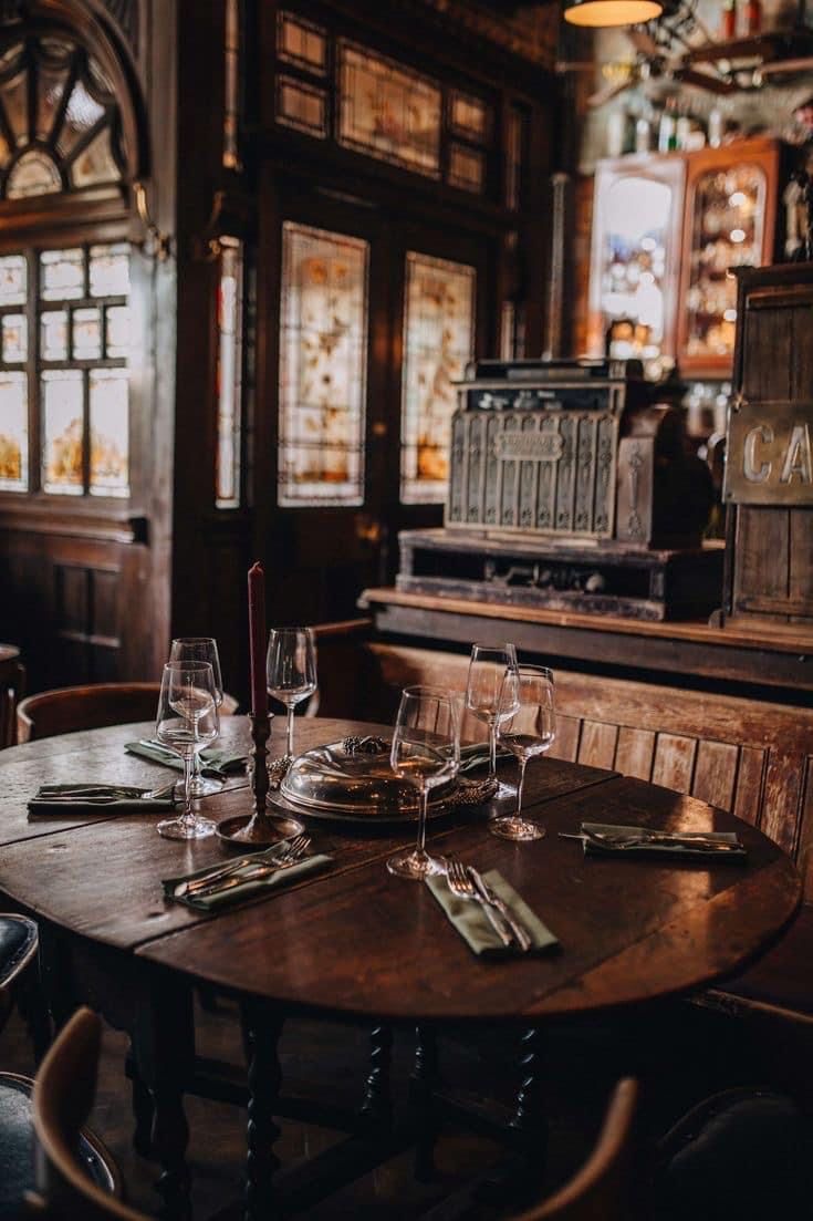 A quiet restaurant interior set for service